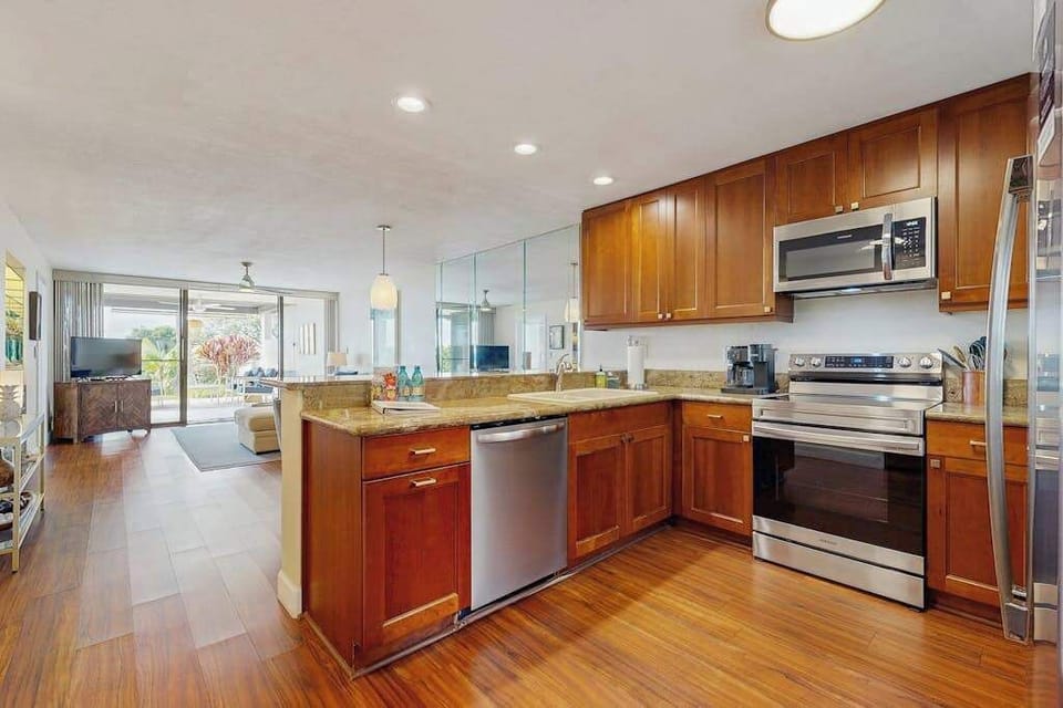 Sleek, modern kitchen setup with all the essential appliances you need for a comfortable stay