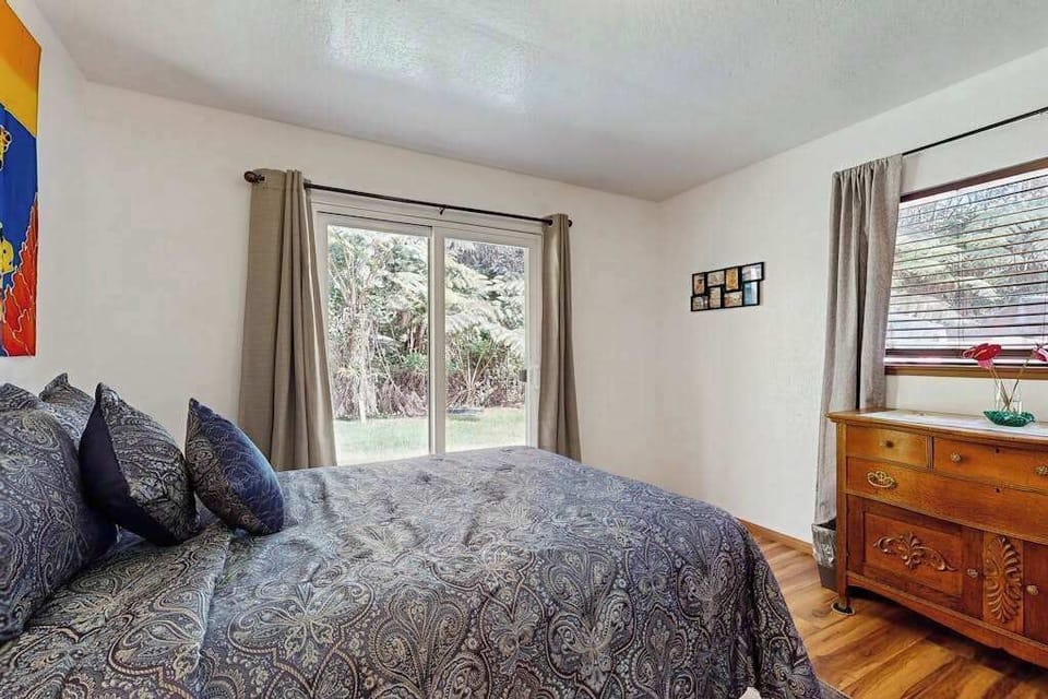 Cozy Bed with Sliding Glass Door Lawn Access