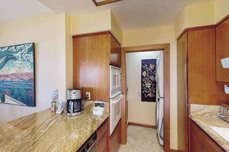 Built-In Ovens, Coffee Station & In-Unit Laundry Access