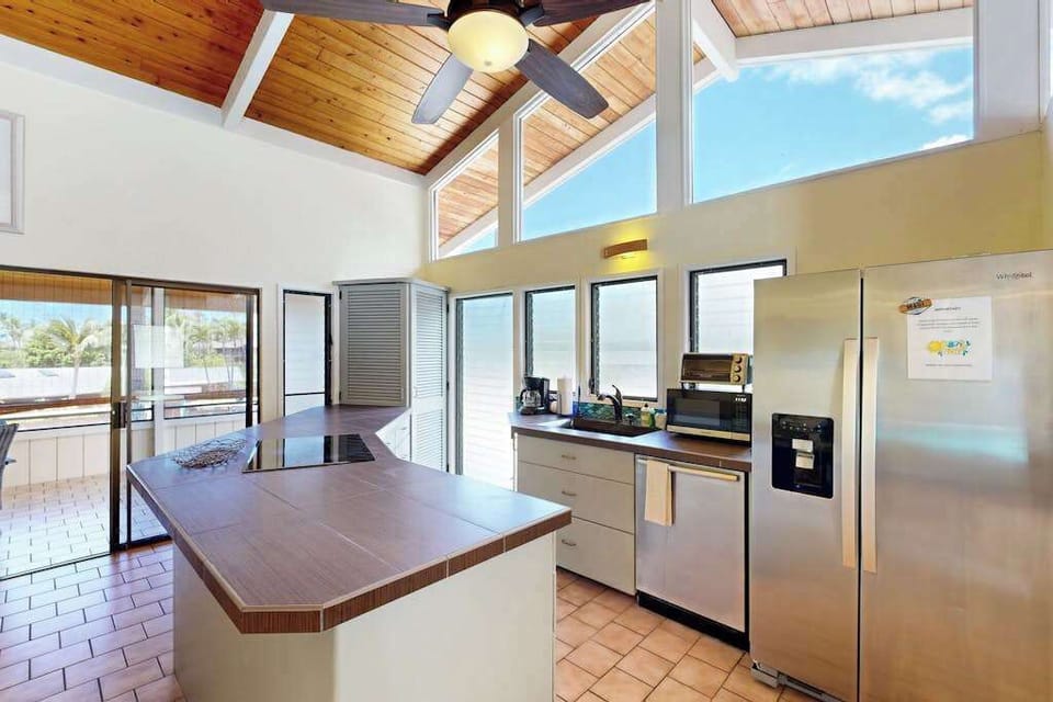 Fully Equipped Kitchen with Stainless Steel Appliances & Island
