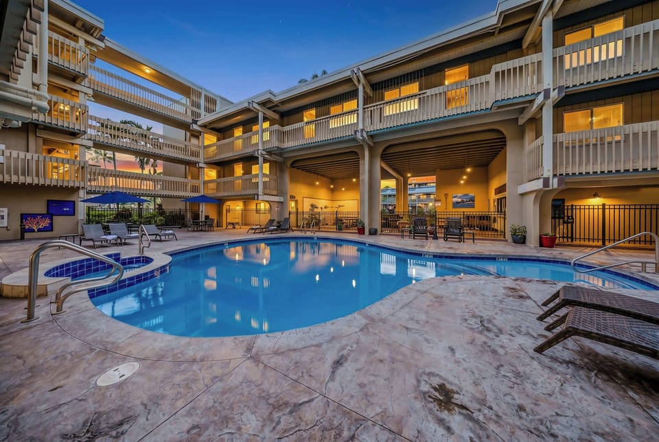 Sparkling Courtyard Pool Illuminated For A Refreshing Evening Swim
