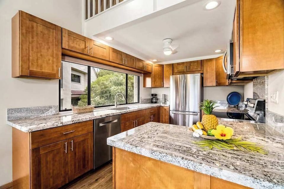 A fully equipped kitchen with modern appliances and ample counter space for preparing delicious meals