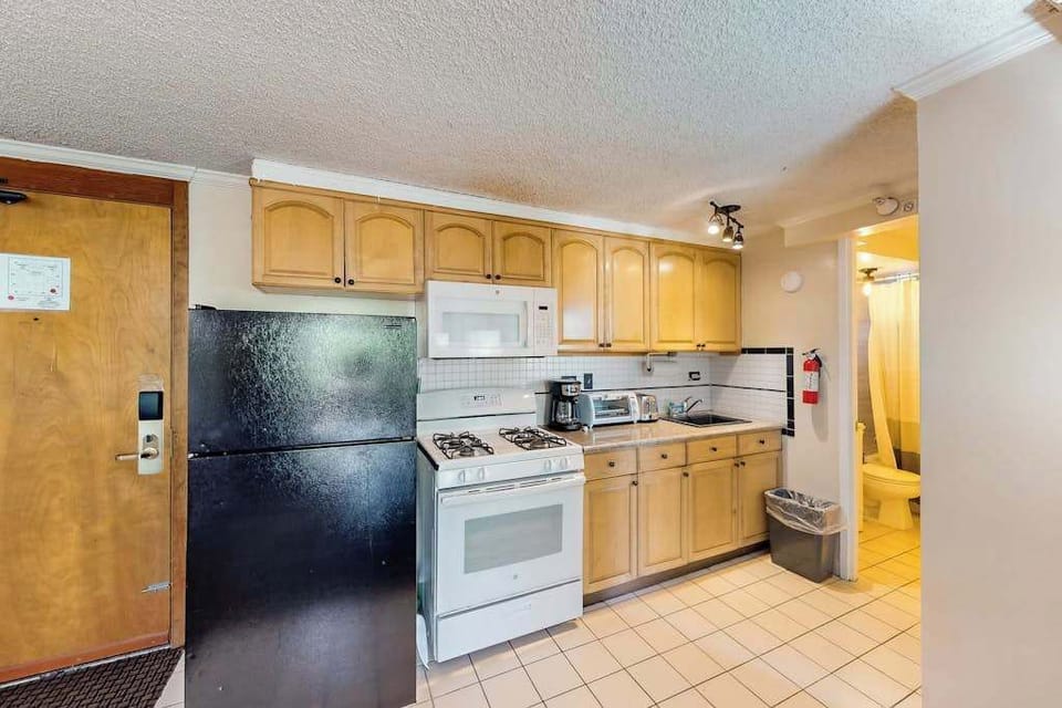 Enjoy the freedom to cook comfortably in this fully equipped kitchen.