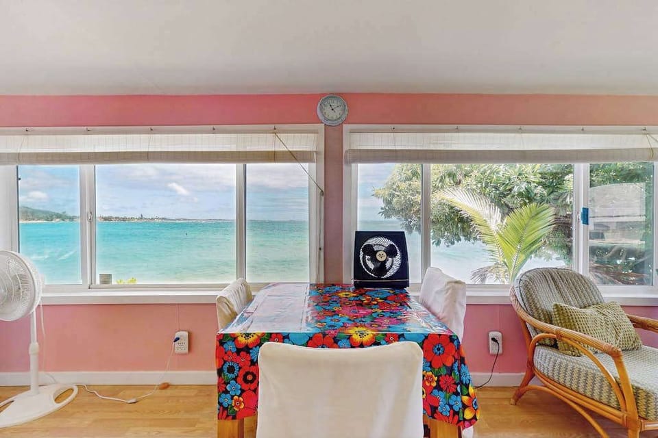 Dining area with ceiling fans and beautiful ocean views