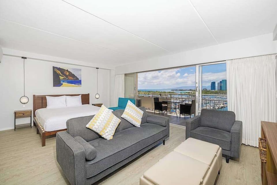 A cozy living room with a bright sliding door to let the sunshine in