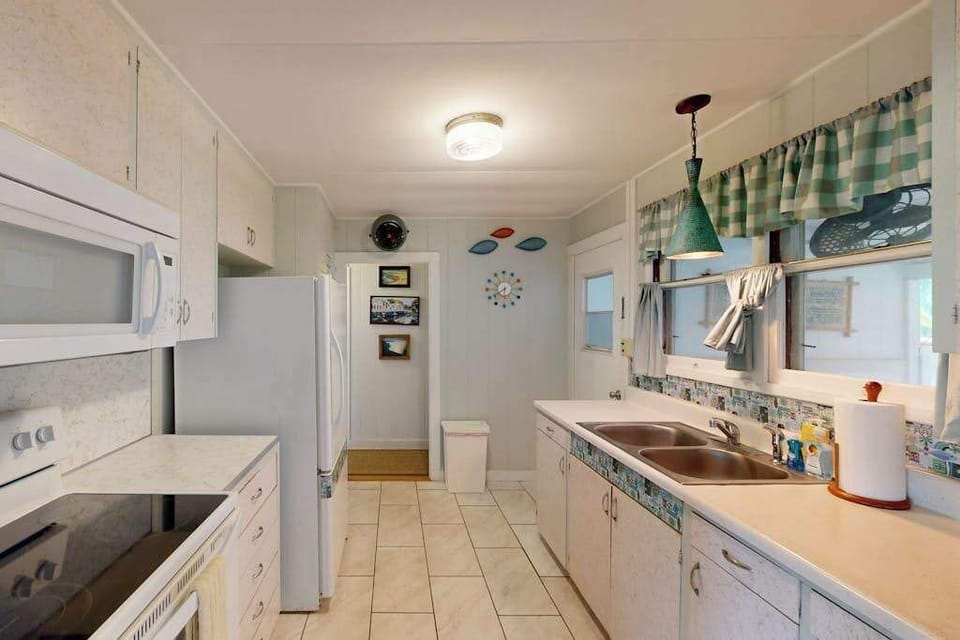 Create memorable family dinners inside this inviting fully equipped kitchen every evening
