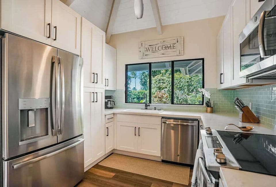 Fully remodeled kitchen with new stainless steel appliances.