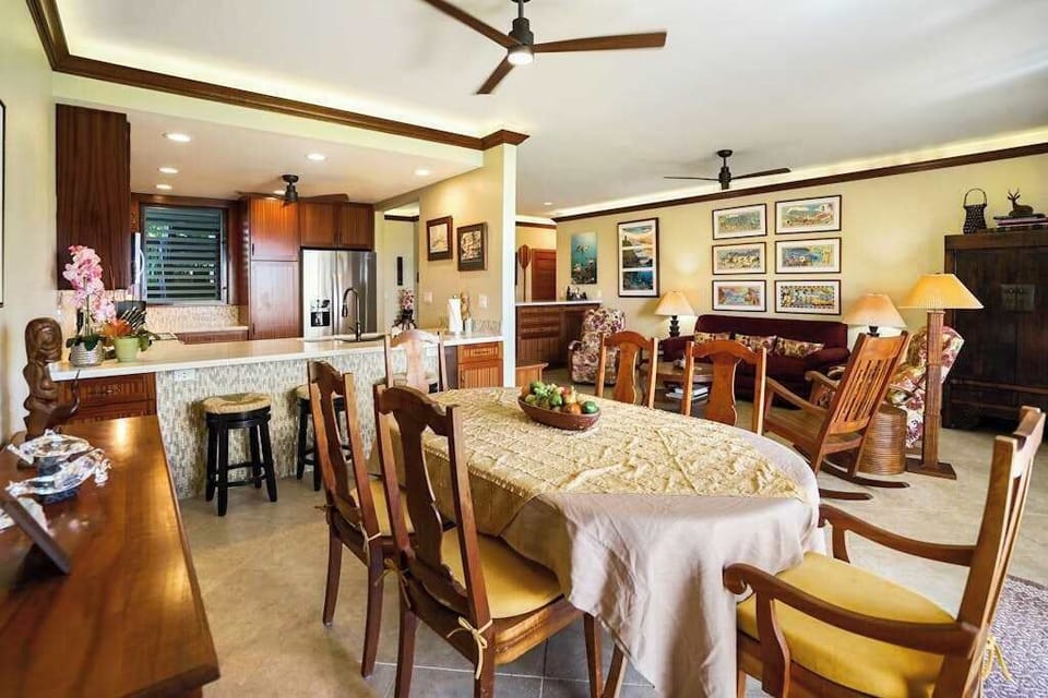 Dining room with seating for six while you take in the tropical views out the sliding glass door.