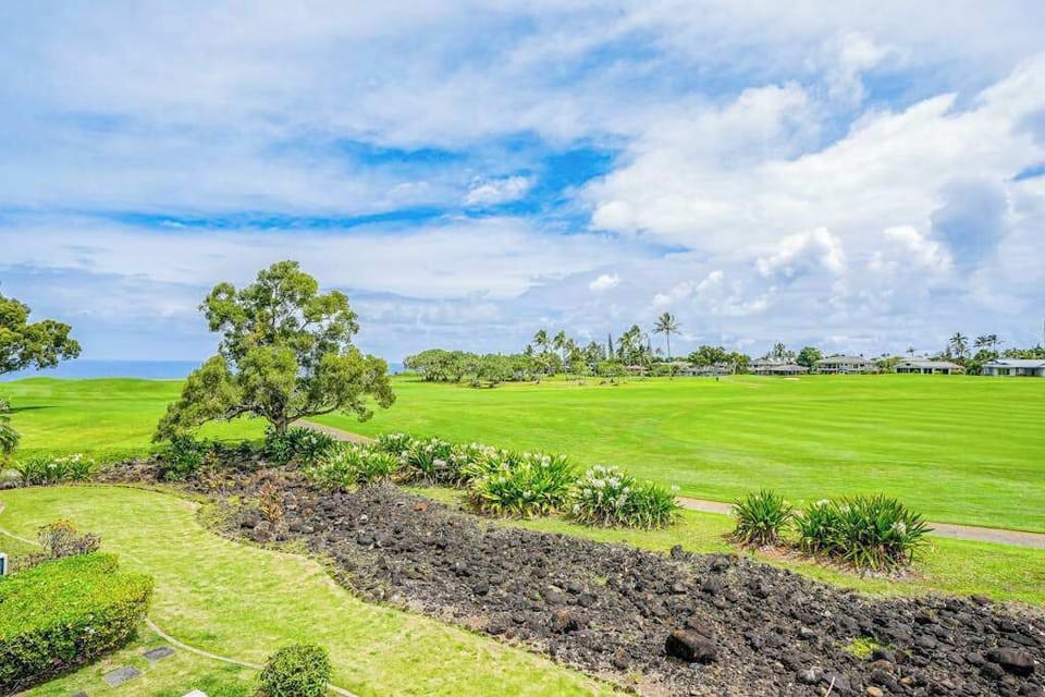 Expansive green landscape views surrounding the peaceful property grounds