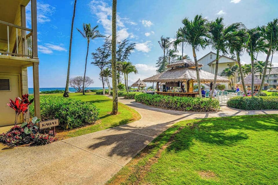 Tropical garden path leading to the resort amenities.