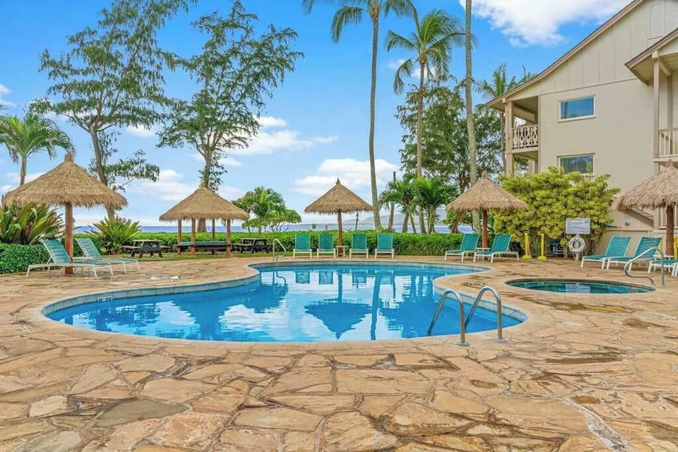 Refreshing Resort Pool Steps From Your Door