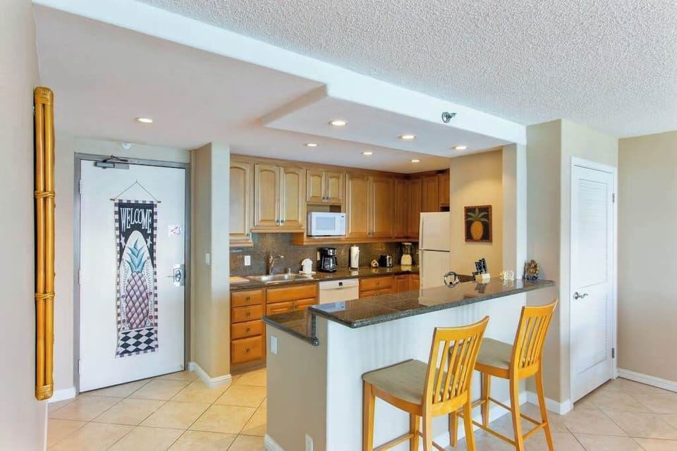 Fully equipped kitchen with a spacious breakfast bar