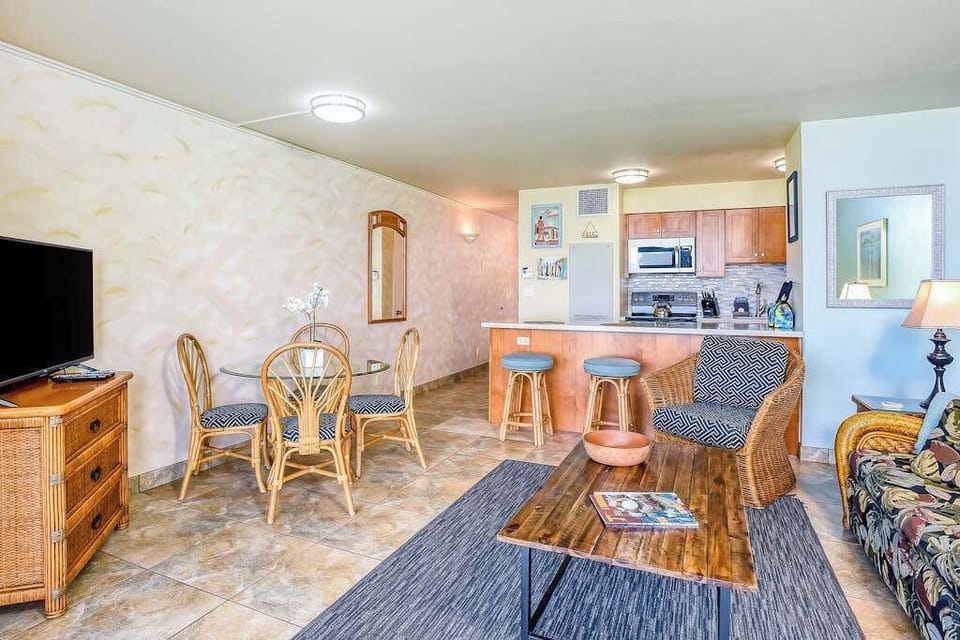 Cozy open-concept living space with a dining area and a full kitchen