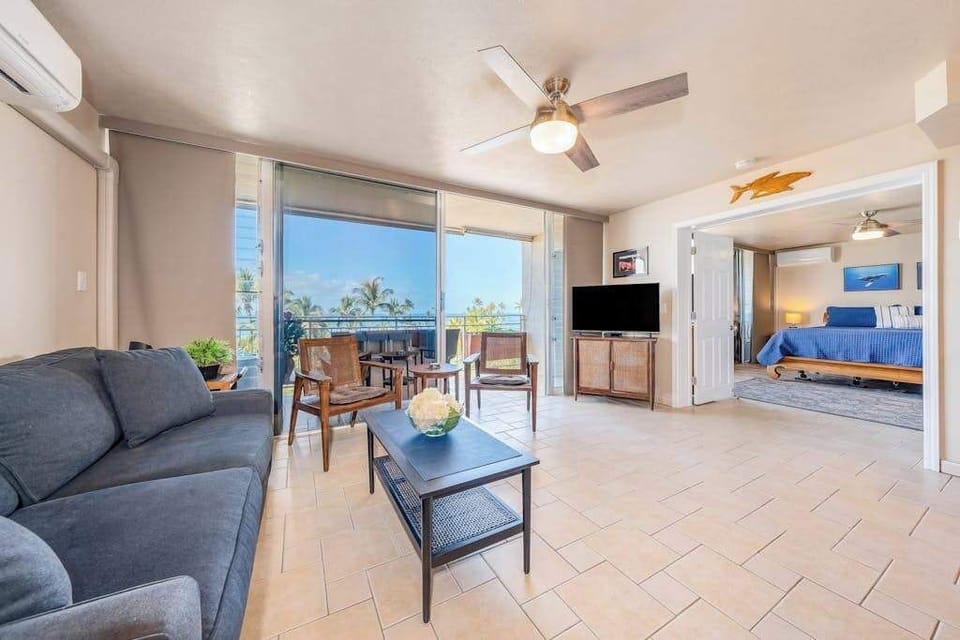 Living room with sofa bed for extra guests and flat screen tv.