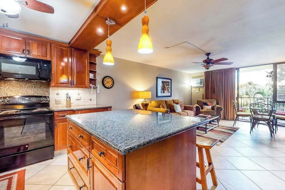 Spacious kitchen with island seating and warm wood cabinetry