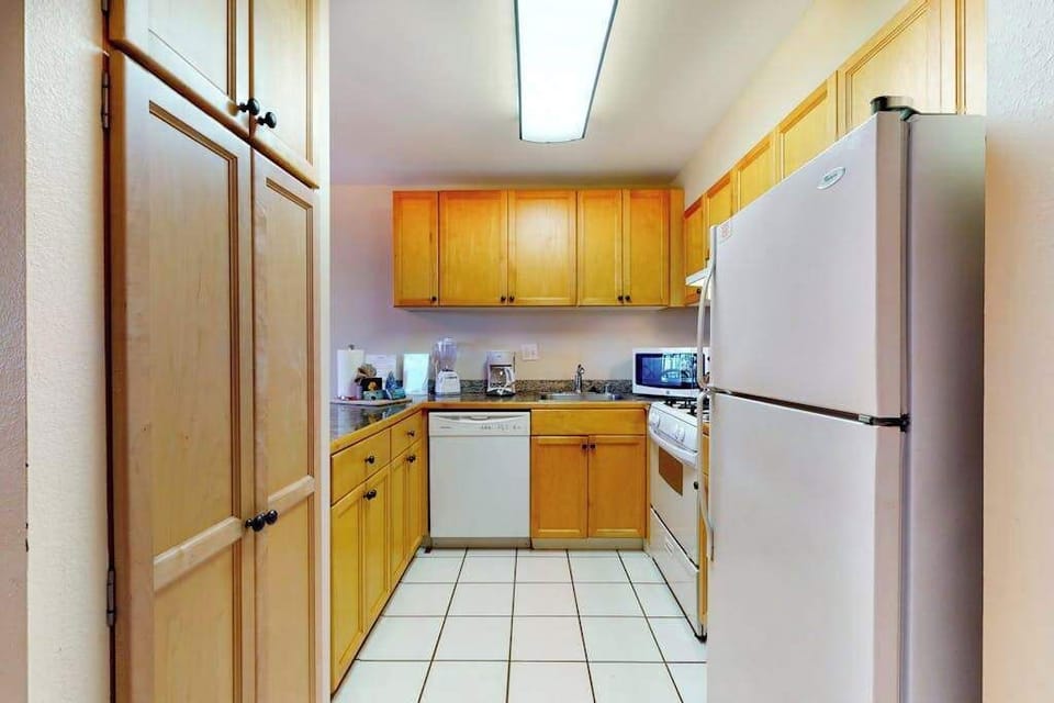 Fully Equipped Kitchen with Ample Cabinetry & Modern Appliances