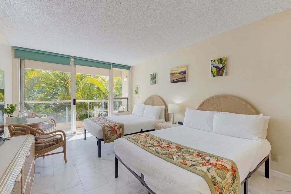 Bright Studio with comfortable seating and peaceful garden views