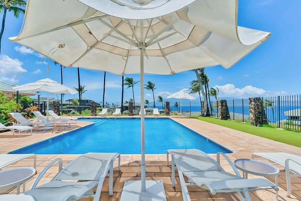 Oceanfront Infinity Pool Beneath Sunny Skies
