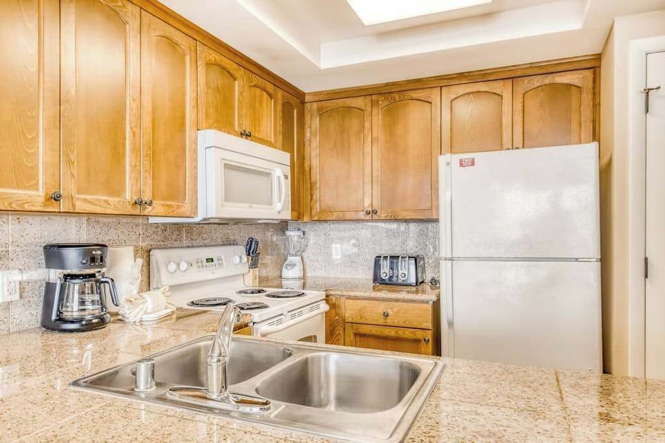 Bright Kitchen Ready For Island Feasts