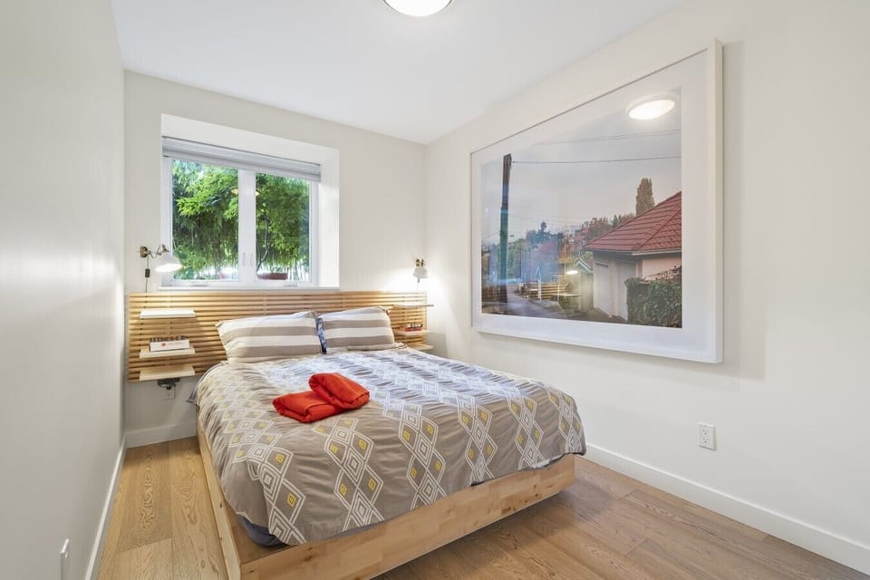 Bedroom: Sleek design with natural light and stunning decor for your perfect retreat!