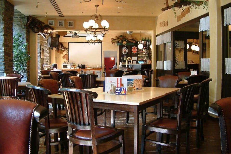 Gather for relaxed meals in a cozy, social dining room.