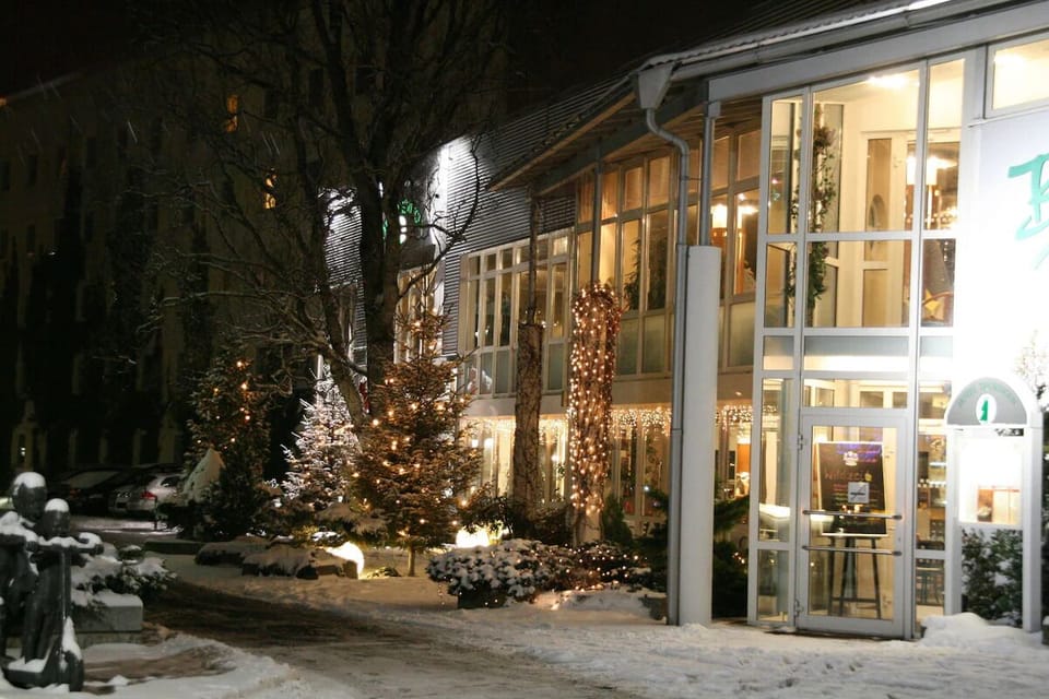 Arrive to a warm, twinkling entrance after snowy adventures.