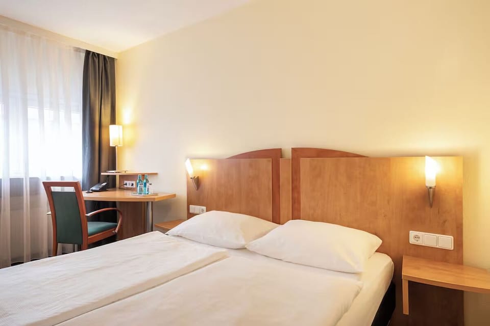 Wake up gently in soft light with bedside reading lamps.