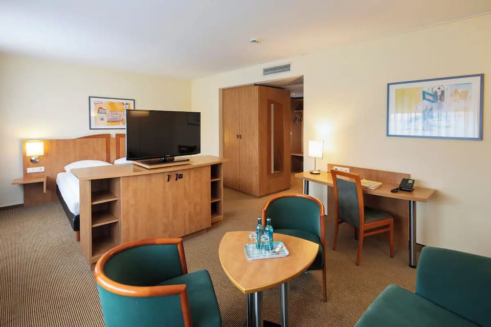 Step into a spacious suite designed for restful nights.