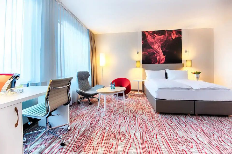 Sink into plush pillows and enjoy the airy, modern space.