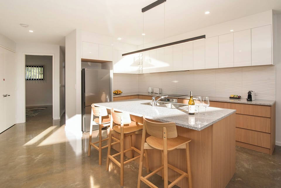 Bright modern kitchen with spacious island seating for four