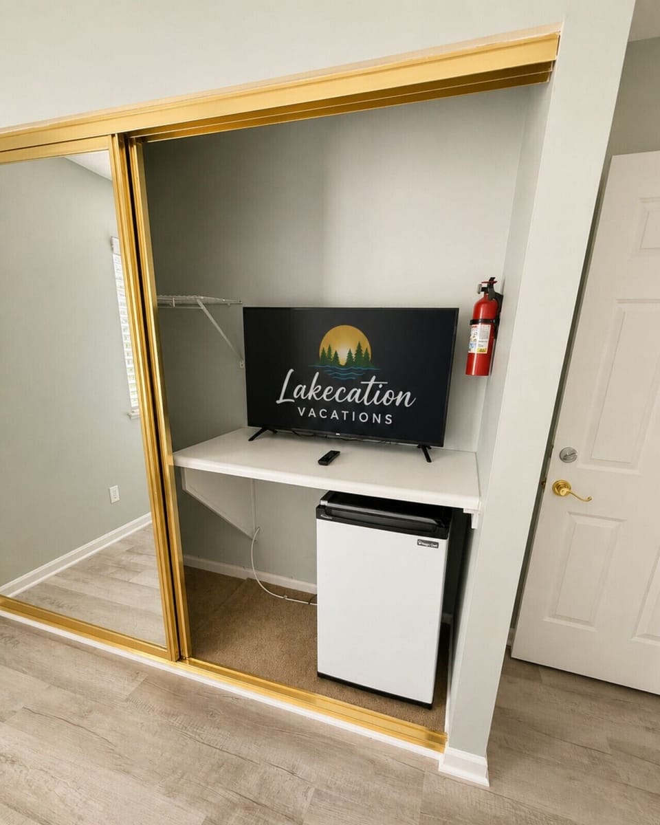 Stay refreshed with a convenient mini fridge and Smart TV, thoughtfully tucked into the bedroom for added comfort.