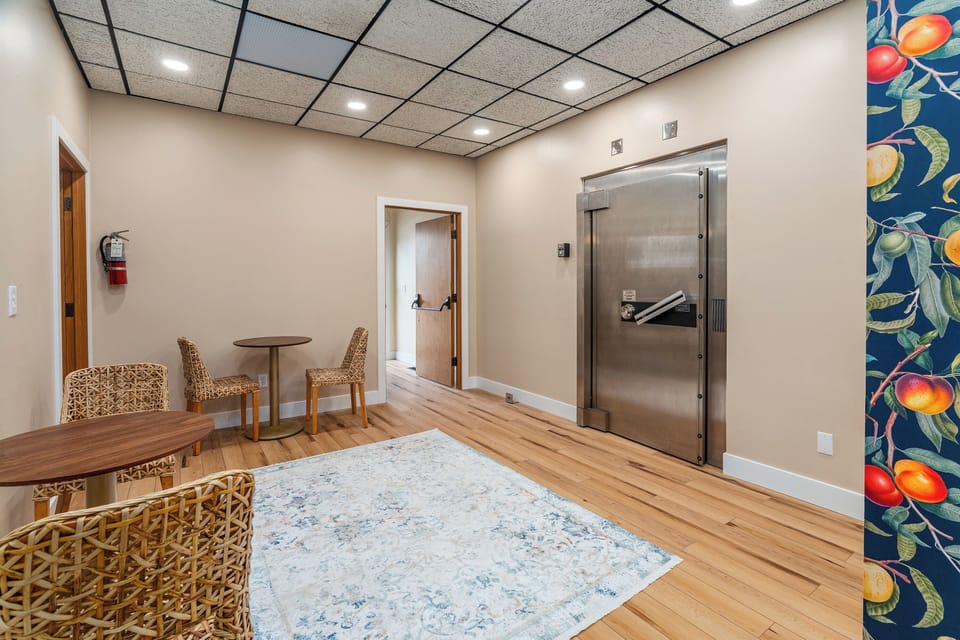 Walk past the bank's vault to the hot tubs and patio. 