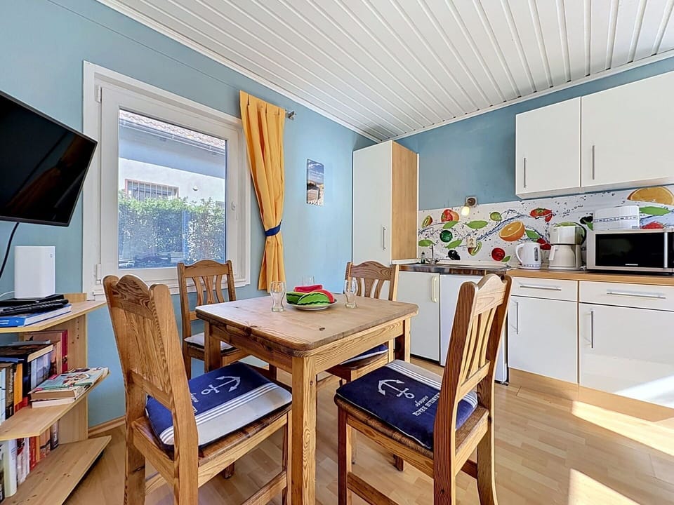 Furniture, Interior Design, Flooring, Floor, Wood, Ceiling, Table, Lighting, Room, Chair