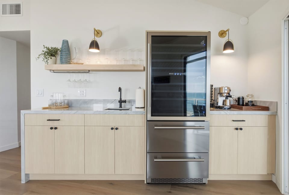 Bar with wine fridge and prep sink