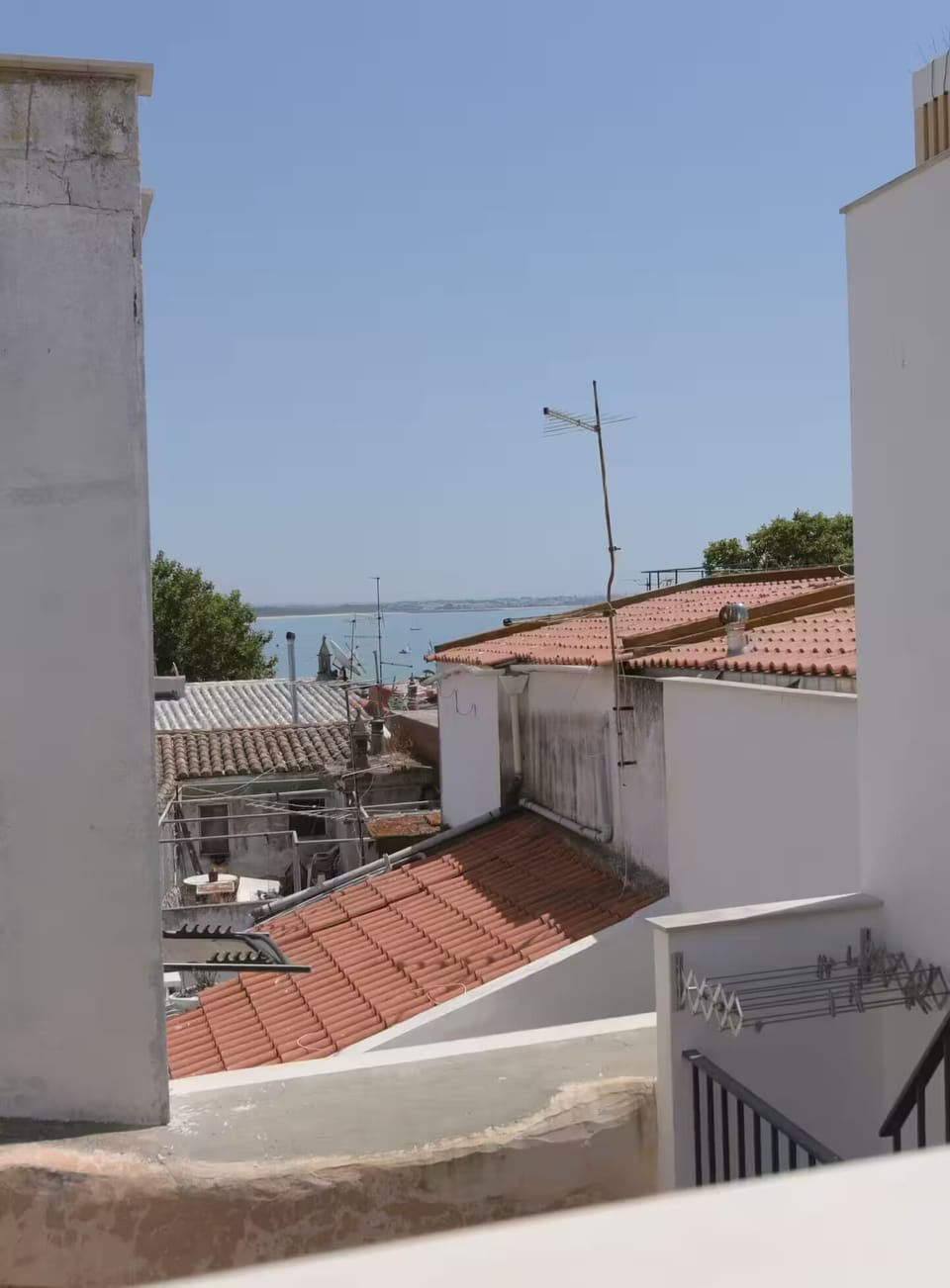 Rooftop views over Lagos’ old town rooftops and towards the sea