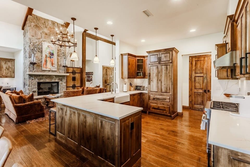 Large kitchen island and wood cabinetry