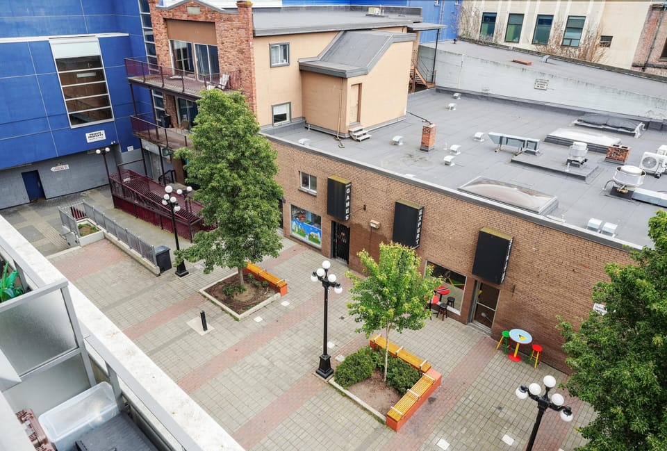 Enjoy your morning coffee or an evening drink on your private balcony, complete with cozy outdoor seating.