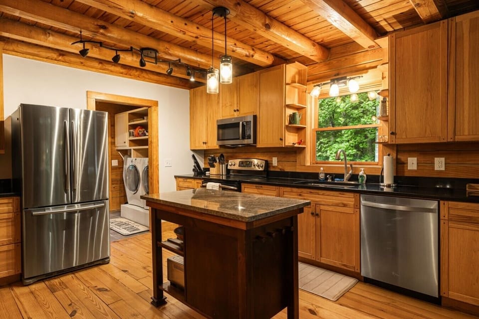 Kitchen | Stainless Steel Appliances | Wooden Cabinetry & Island