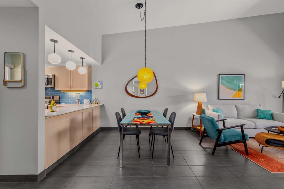 Dining area includes table and chairs for 6 guests.