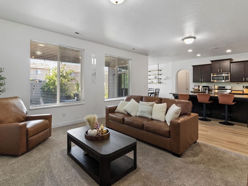 Seamless flow from living to dining areas. One cohesive space designed for families and groups to gather naturally.