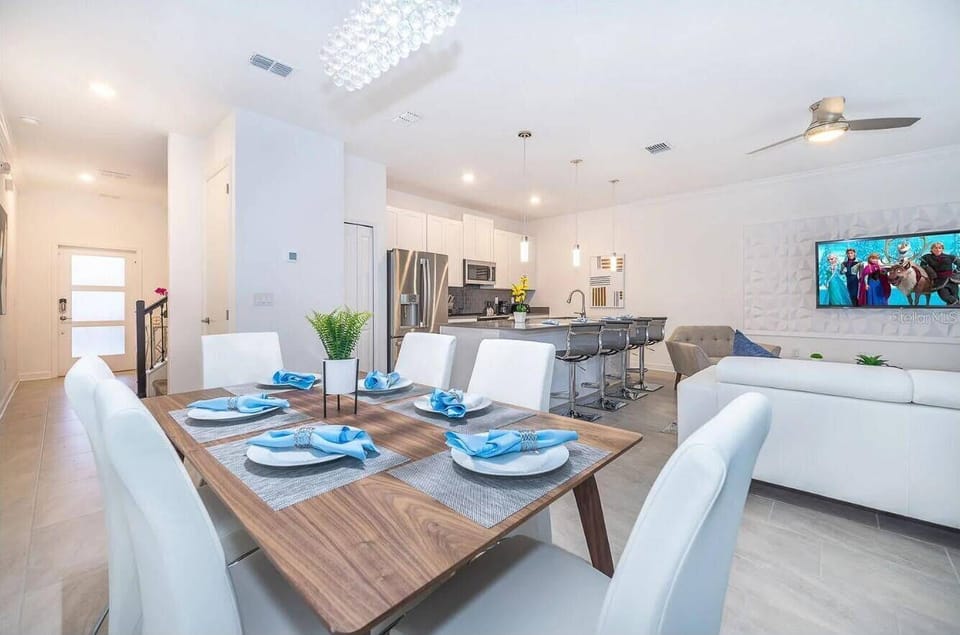 Bright open-concept dining, kitchen & lounge with stylish modern finishes