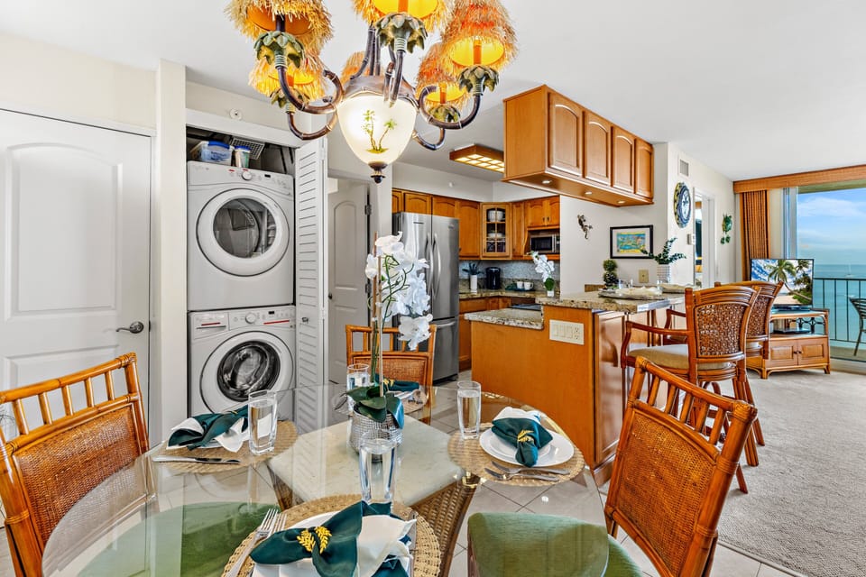 The dining area sits adjacent to the fully equipped kitchen, making meals easy and convenient.