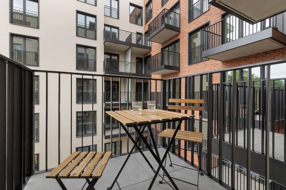 The balcony's peaceful ambiance is ideal for unwinding.