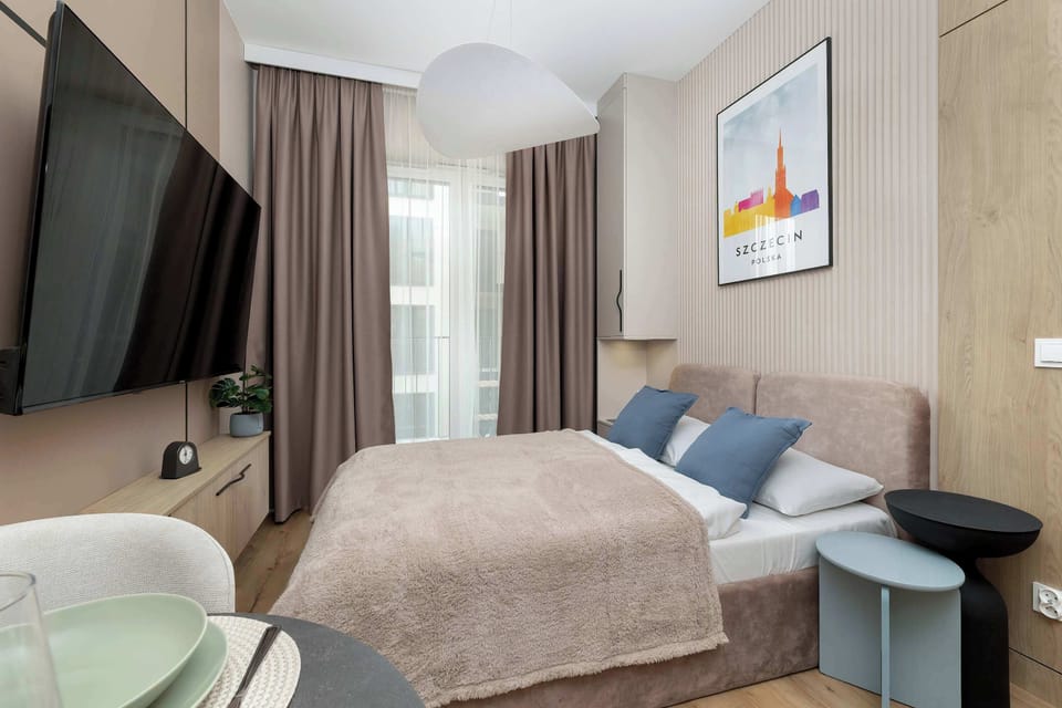 The bedroom's minimalist decor promotes a peaceful environment.