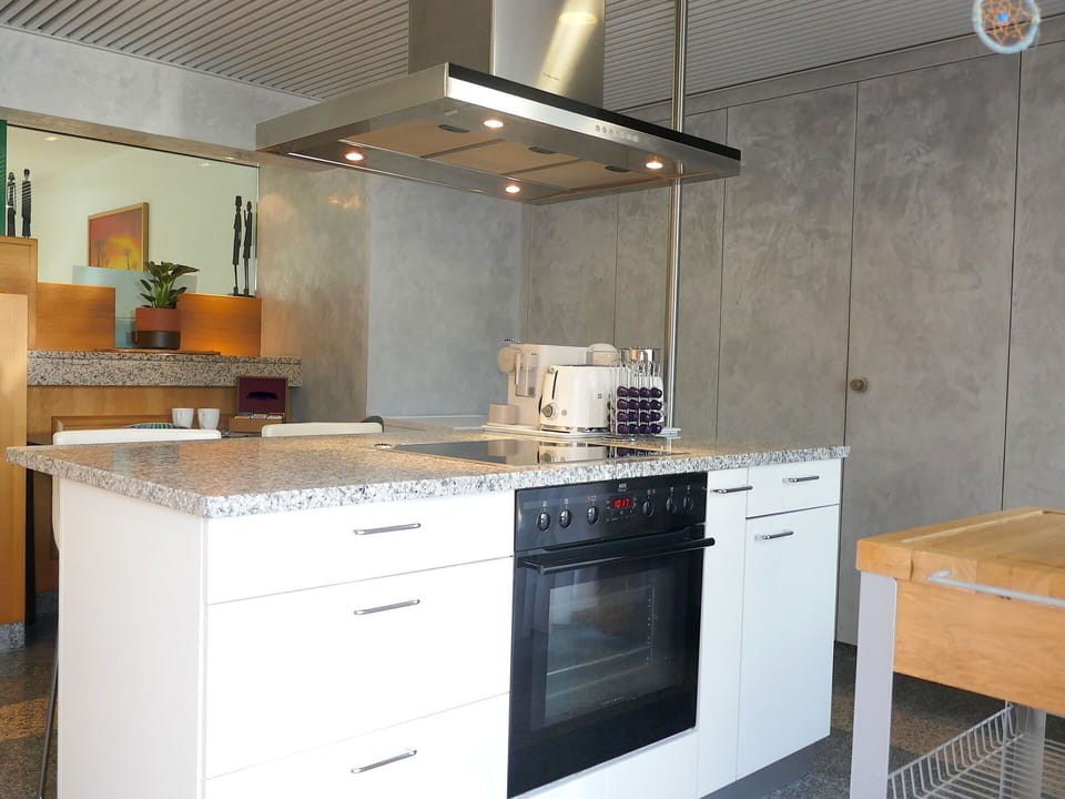 Flooring, Countertop, Kitchen, Kitchen Appliance, Wood, Interior Design, Cabinetry, Floor, Furniture, Major Appliance