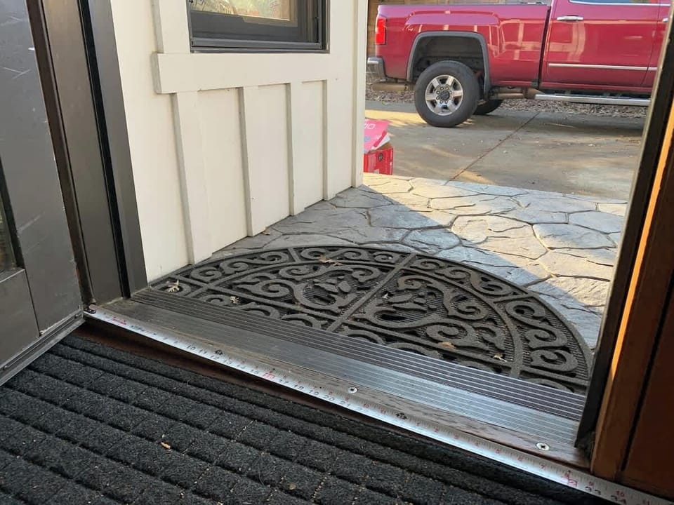 The front door provides a 32” opening. Double doors can be opened fully to a 52” opening allowing guests to enjoy the deck.