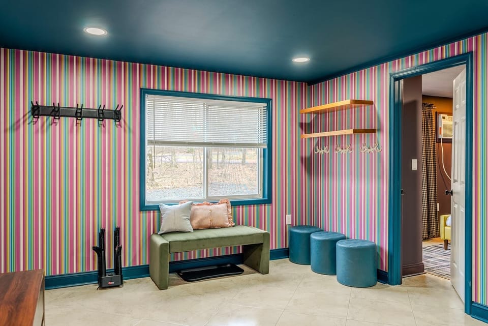 Designed for convenience and style, this colorful mudroom is the perfect landing pad after a day of adventure. 