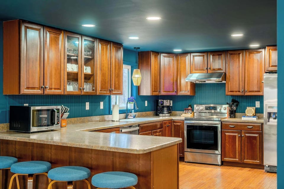 Cook in Style – This kitchen features high-end appliances, ample storage, and everything you need for a seamless culinary experience.
