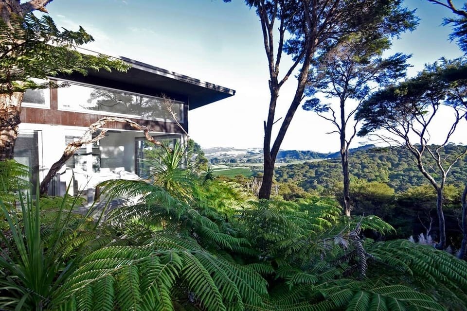 The property at 19 Musson Drive is secluded and private, boasting uninterrupted views of Waiheke Island's luscious greenery. 
