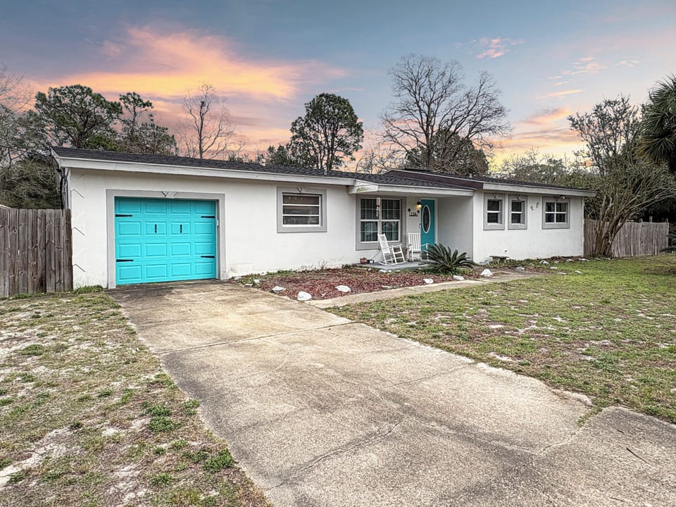 Charming single-story home with bright entry, garage, and relaxing front porch